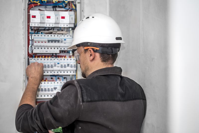 Technicians Installing Transfer Switch